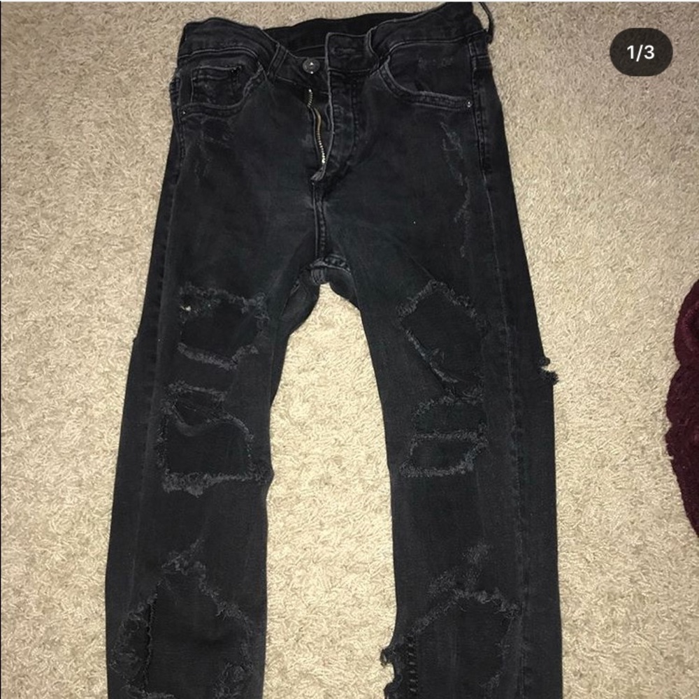 black ripped jeans